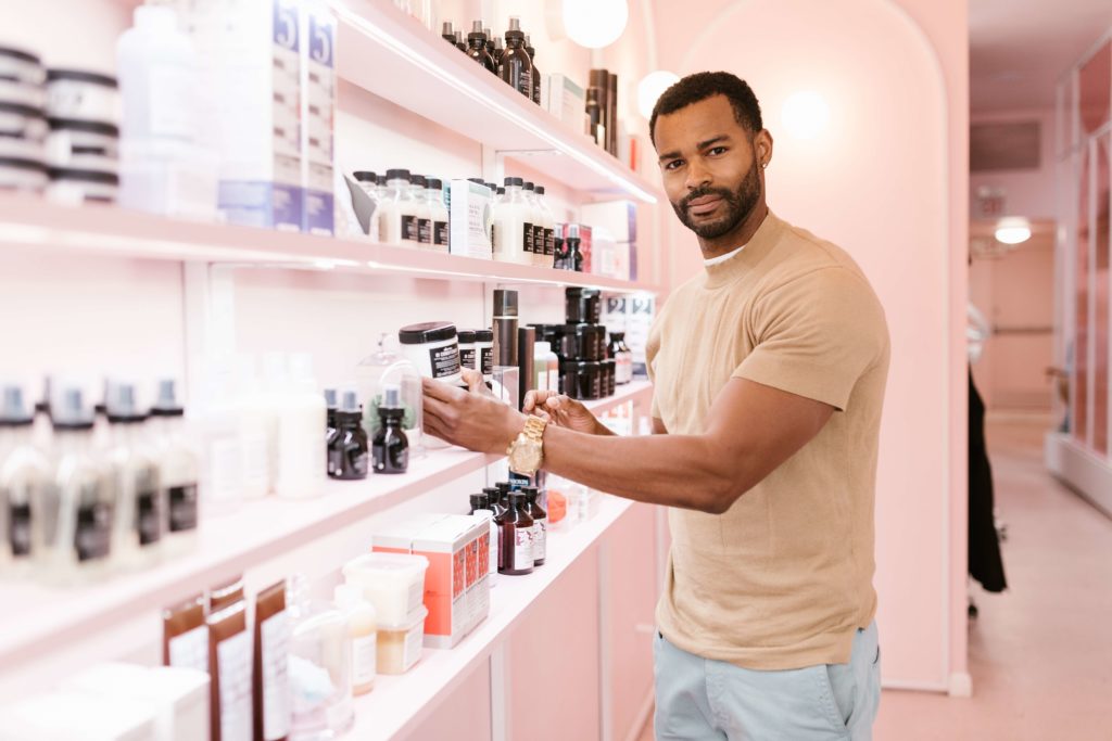 Hairdresser using salon reports to check stock